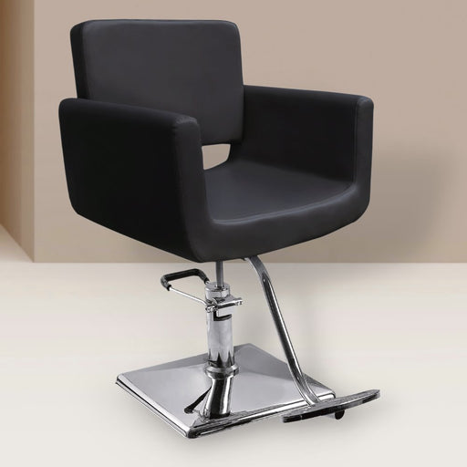 Black vegan leather styling chair. Stylist chair with square chrome base and rounded upholstered arms.