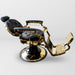Black and gold traditional barber chair reclined