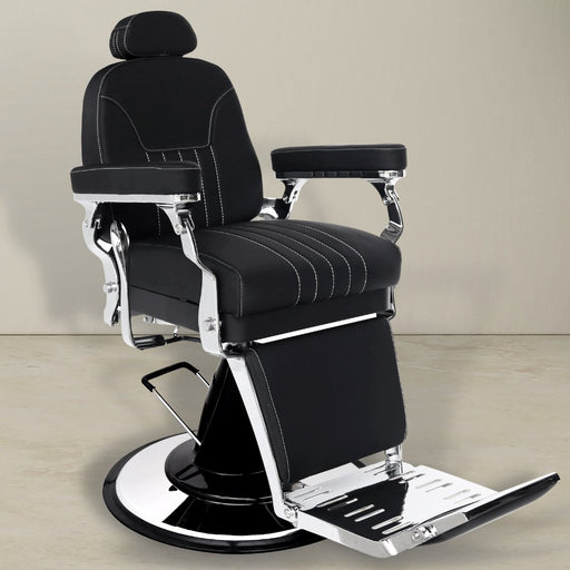Transitional barber chair. Upholstered in black vegan smooth leather. contrast stitch. Padded arms and black and Chrome base.
