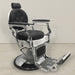 black and white antique barber chair. Black vegan leather. Diamond Tufted design. white and gun metal finish.
